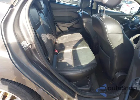 2014 Ford Focus Titanium z USA, uszkodzony, nr VIN 1FADP3N27EL297885